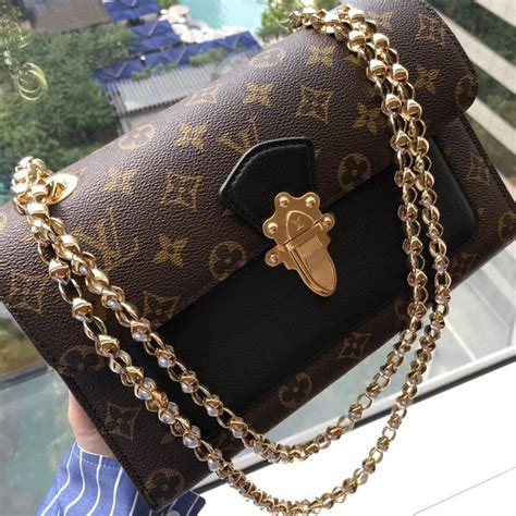 louis vuitton handbag with gold chain|louis vuitton wallet with chain.